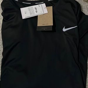 Brand New Nike black long sleeve dri-fit tee.